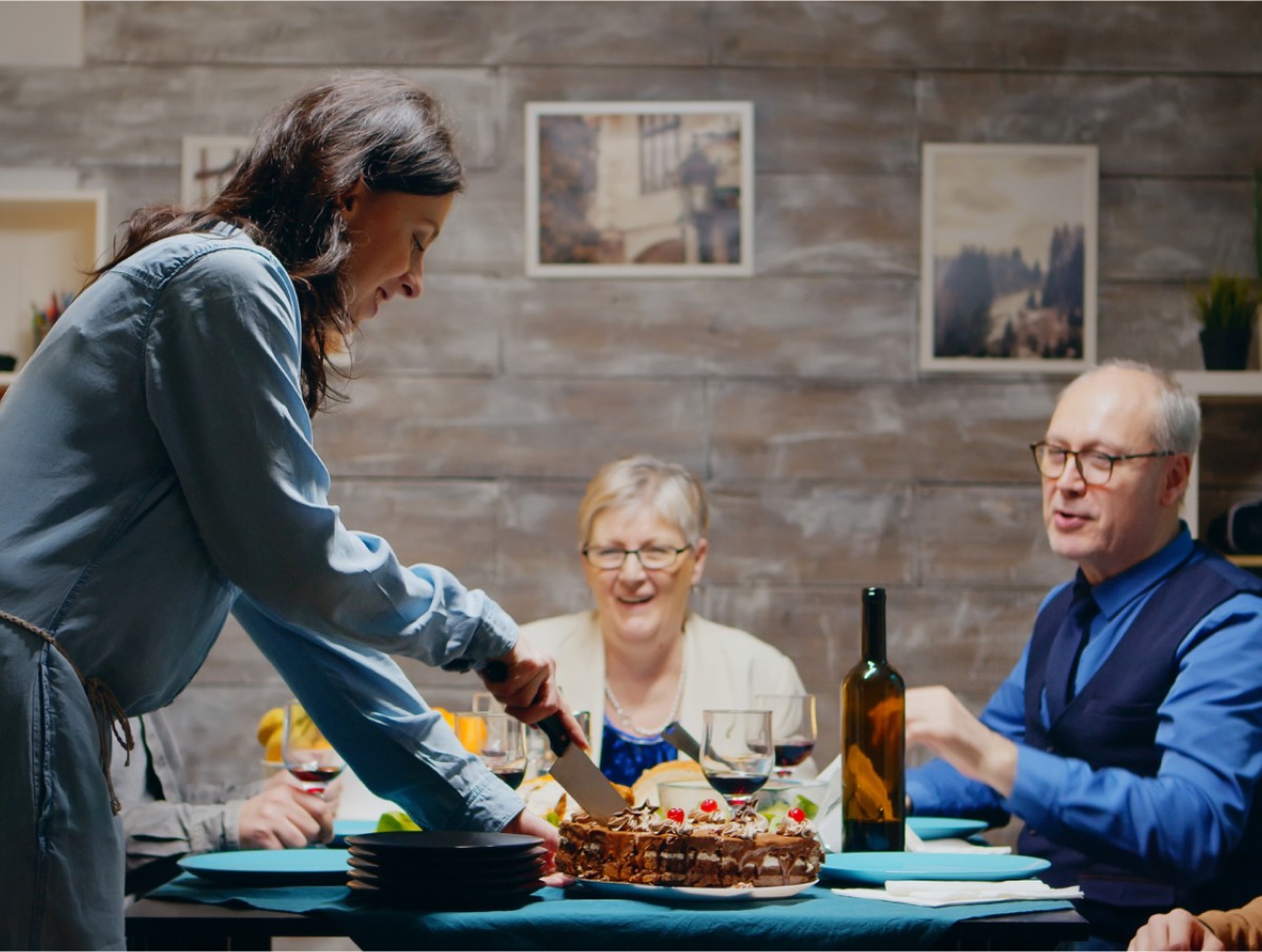 Elderly woman with a caregiver